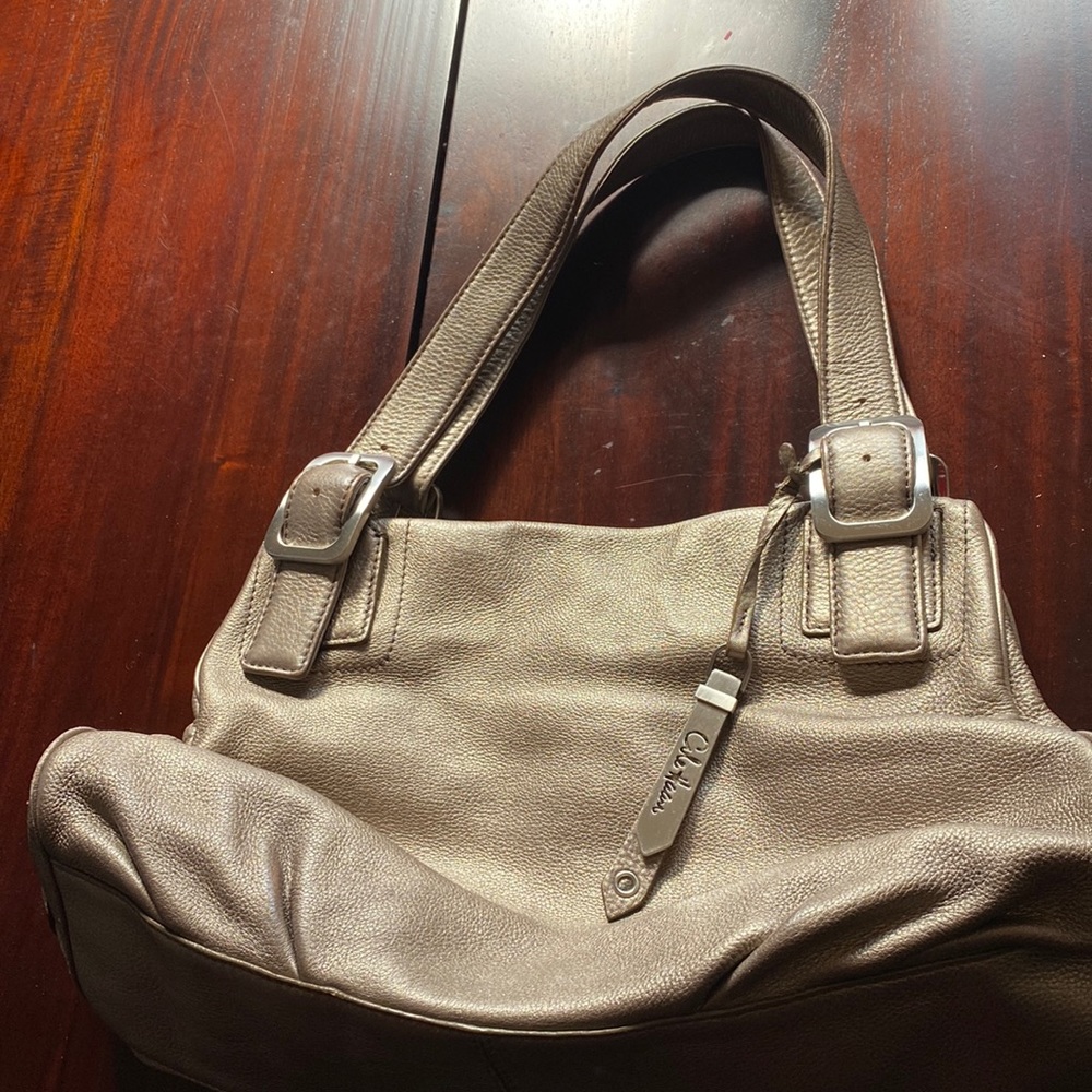 Gold leather satchel purse.